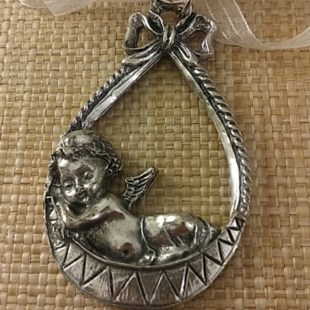 Baby Sleeping Crib Medal.